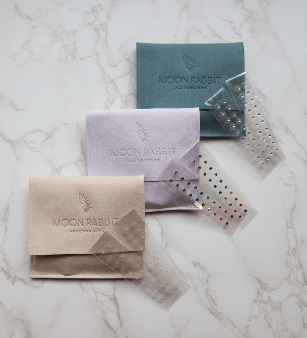 Moon Rabbit rose-gold tweezers support precise application and tidy storage.