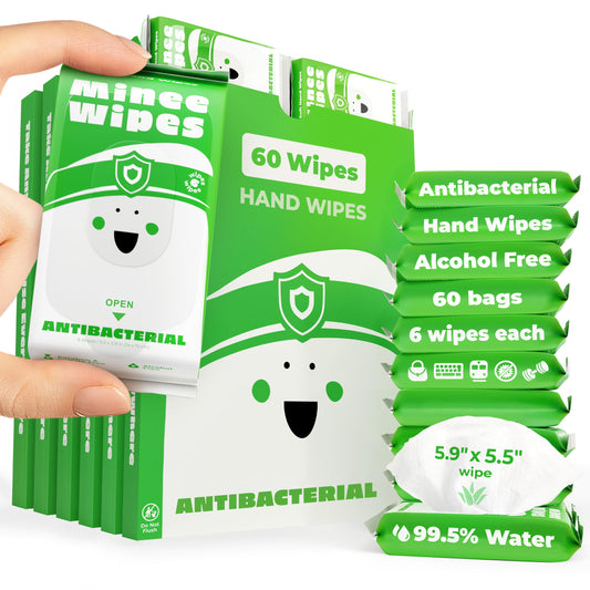 Moonies compact travel wipes in wallet-sized pack for quick on-the-go cleaning.