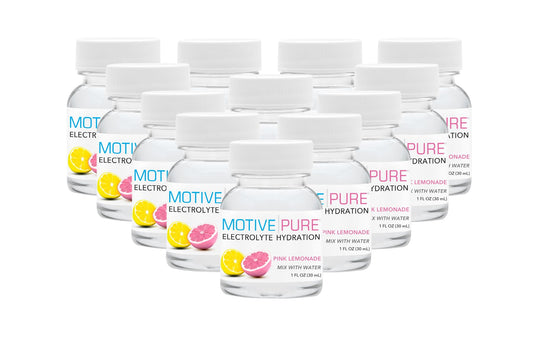 MOTIVE PURE pink lemonade mini bottle close-up for on the go hydration