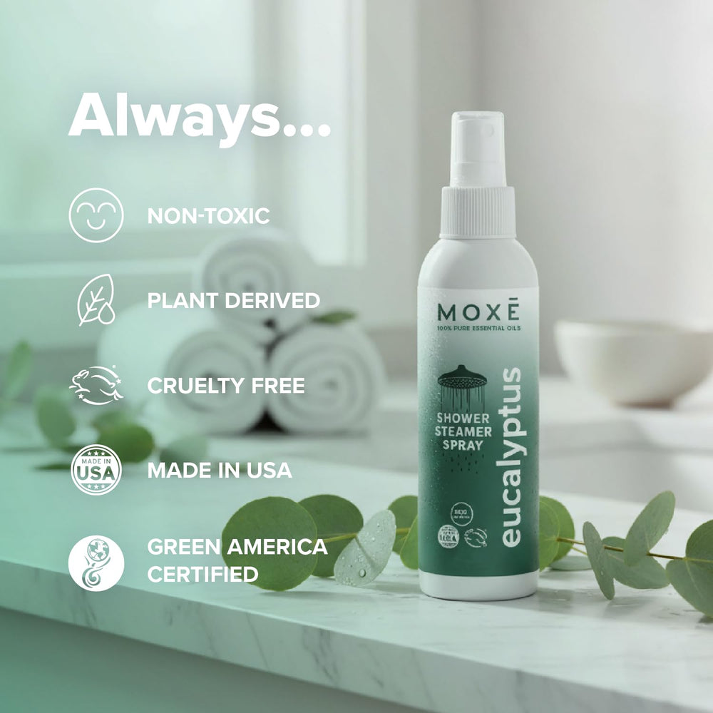 Mist being dispensed from MOXE spray as you shower