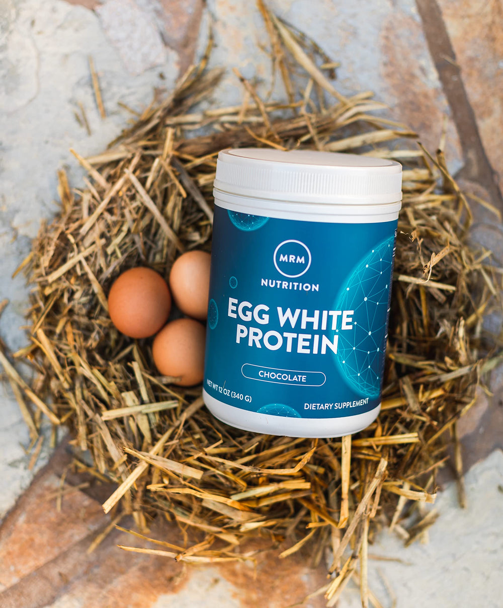 MRM Egg White Protein Chocolate with scoop, easy to measure for daily protein intake.