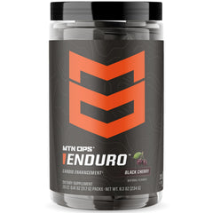 MTN OPS Enduro Trail Packs black cherry powder dissolving in water for non-stim energy support