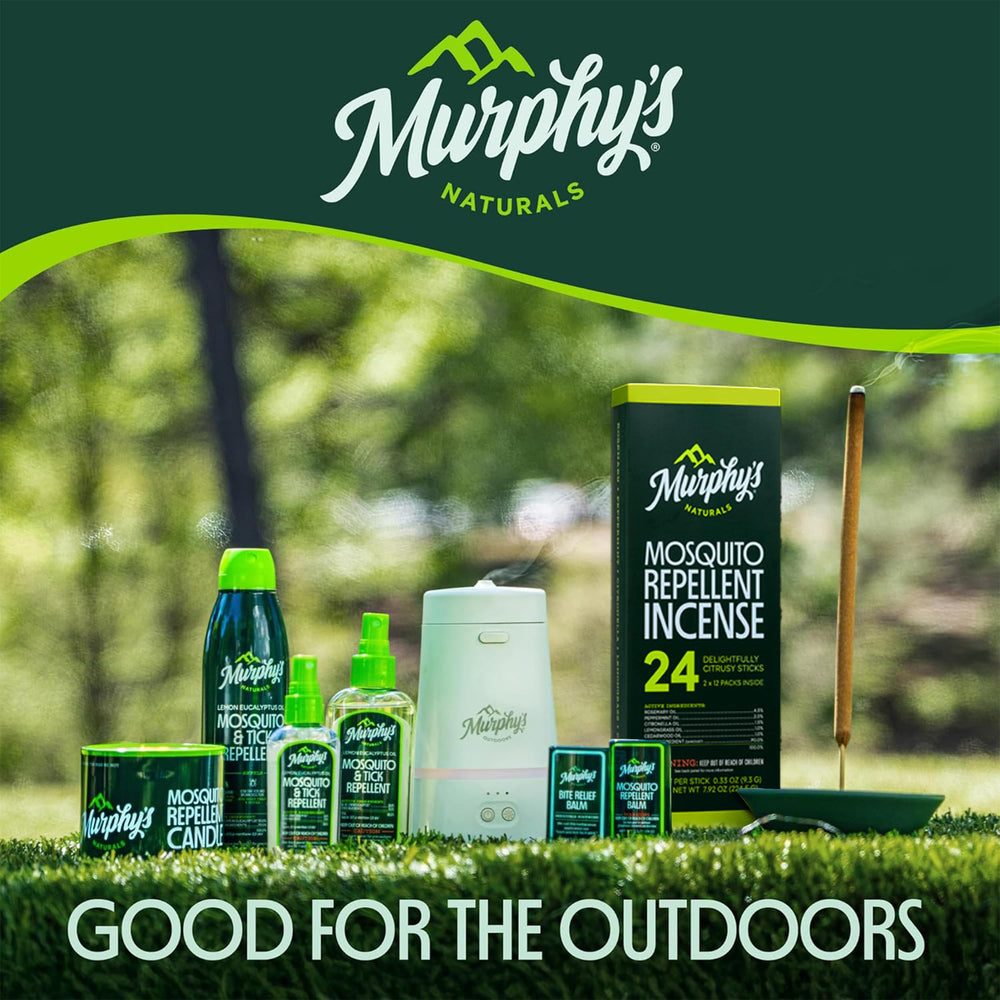Close-up of Murphy's Naturals candle with essential oils for outdoors