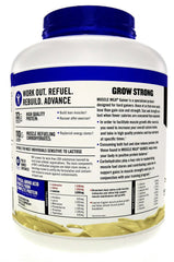 Muscle Milk Gainer measuring scoop beside the canister