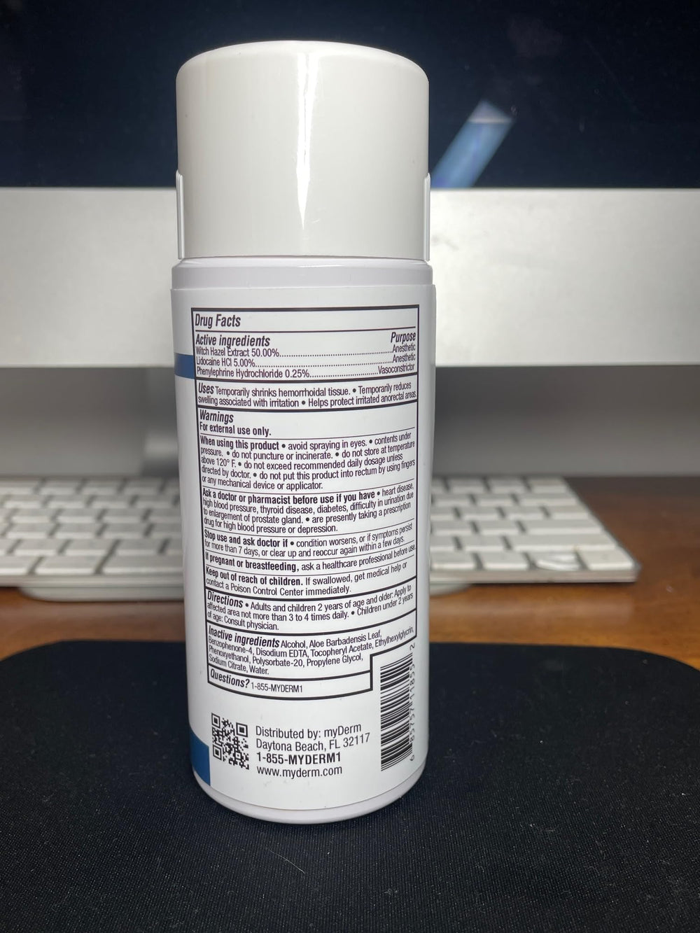 Myderm Three Pack Numbing Spray in use for quick self-application.