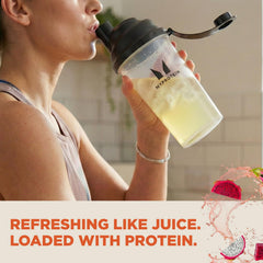 Myprotein Clear Whey Isolate tropical dragonfruit pour shows a translucent juice-like texture