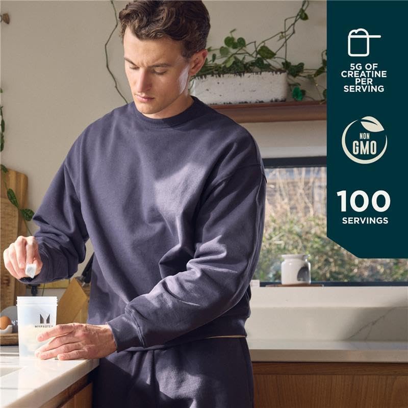 Scoop of Myprotein Creatine Monohydrate powder for pre workout use