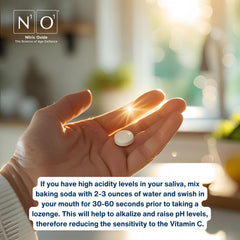 Close-up of N1O1 lozenge dissolving in the mouth.