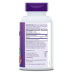 Natrol melatonin 3mg bottle on nightstand with dim lighting.