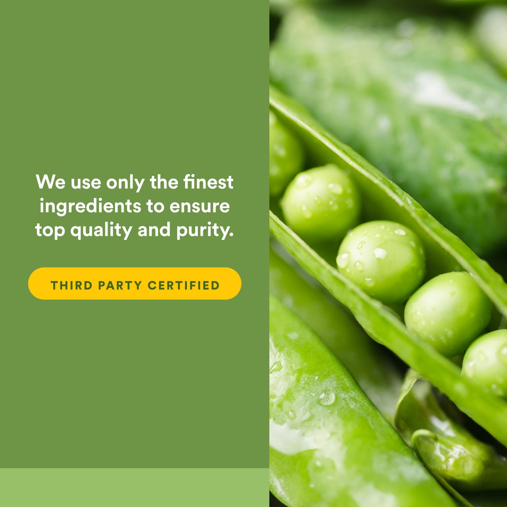 Green smoothie ingredient bottle beside fresh produce by Natural Factors