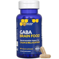 NATURAL STACKS GABA Brain Food capsules being poured suggesting easy nightly use