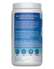 Bottle and glass setup highlighting CALM magnesium supplement in day to night routine