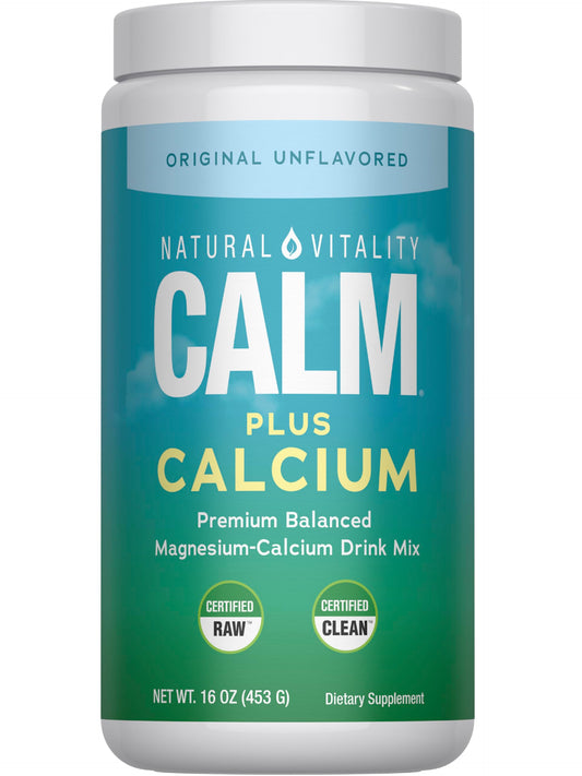 Natural Vitality CALM bottle poured into glass for a calming fizz.