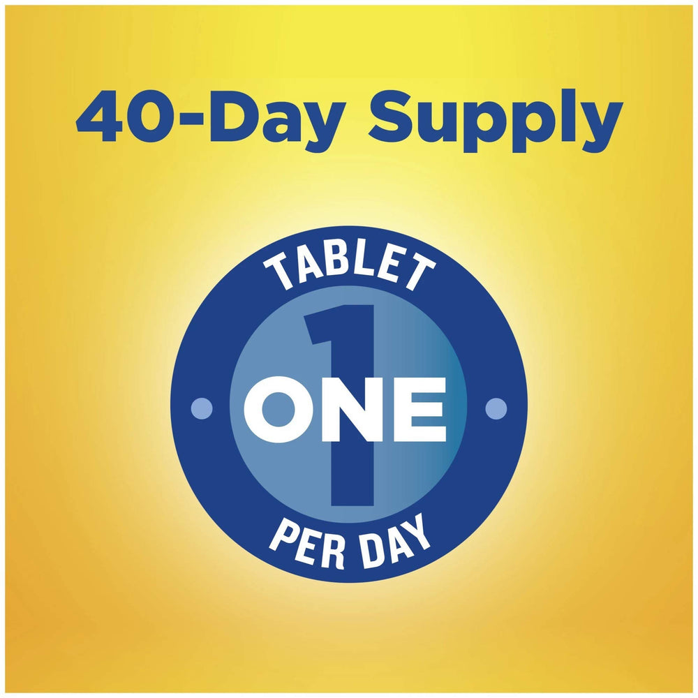 Nature Made Back to Sleep berry flavor tablet resting on the tongue for easy use.