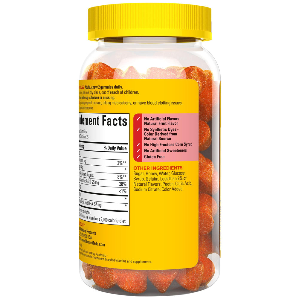 Nature Made Fish Oil Gummies glass bottle on table hints at everyday wellness routine.