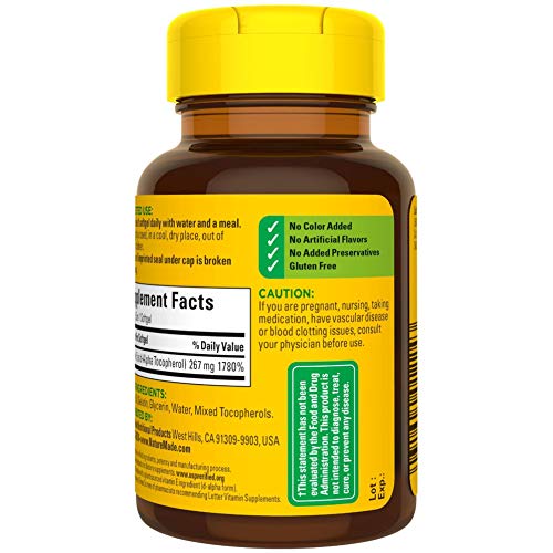 Nature Made Plant Sourced Vitamin E softgel close-up – smooth, oval capsules.