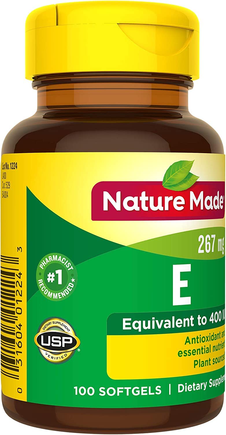 Nature Made Vitamin E softgel close-up showing smooth capsule surface.