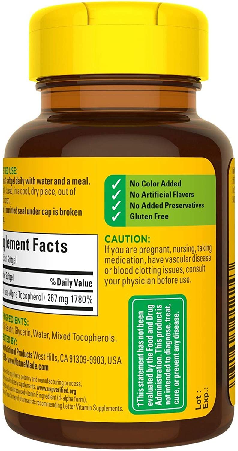 Nature Made Vitamin E label close-up showing gluten-free and no artificial additives.
