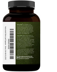 NatureBell olive leaf extract capsules arranged for a daily habit