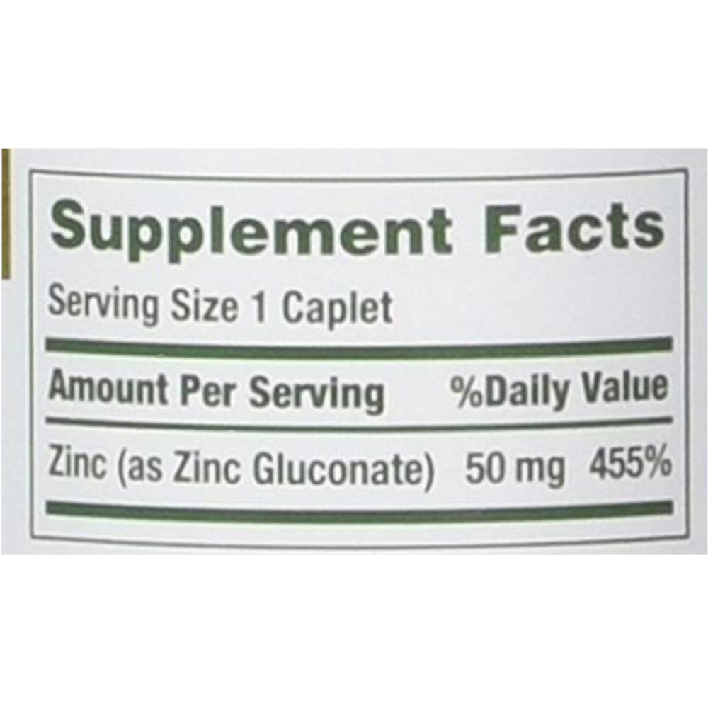 Nature's Bounty zinc caplets close-up showing tablet texture and finish.