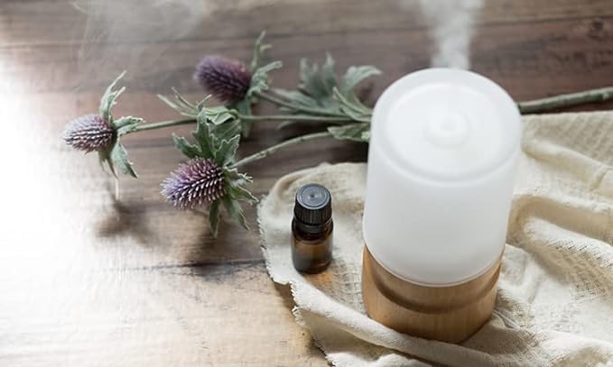 Candlemaking setup with Nature's Note White Sage essential oil for a herbal touch.