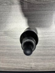 Smooth liquid texture shown in a dosing bottle for easy daily use.
