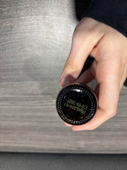 One-dropper serving demonstrated for a simple daily ritual.