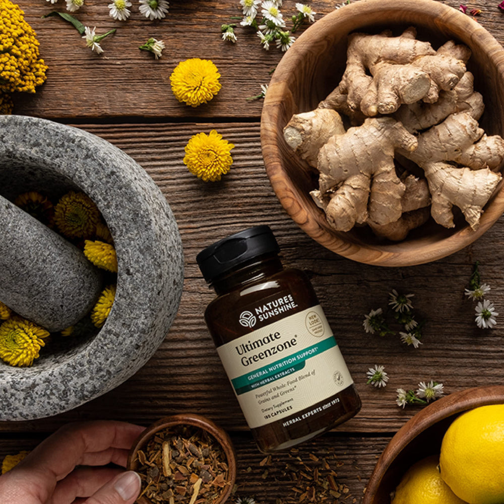 Nature's Sunshine Ultimate Greenzone label highlights grains and greens blend for balanced nutrition.