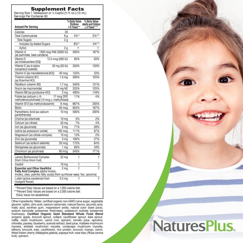 Kids taking the daily tropical berry multivitamin with a smile.