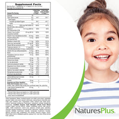 Kids taking the daily tropical berry multivitamin with a smile.