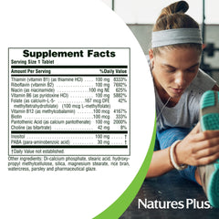 NaturesPlus Mega B-100 tablets in hand convey portable daily supplement.