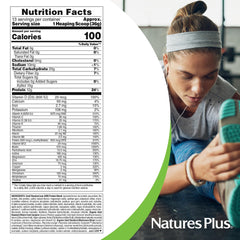 Mixing SPIRU-TEIN GOLD vanilla in a glass of cold milk or water.