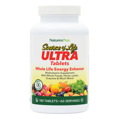 NaturesPlus Ultra Source of Life bottle on a desk, suggesting daily wellness support