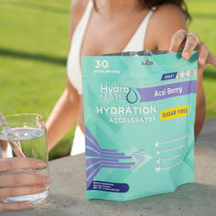 NatureWorks HydroMATE Acai Berry sticks in a backpack for travel and workouts