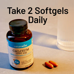 NatureWise bottle with dosage chart and calcium details.