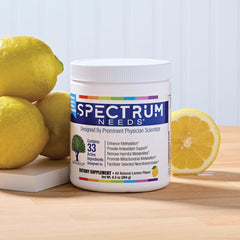SpectrumNeeds lemon flavor scoop beside bottle for easy daily use.