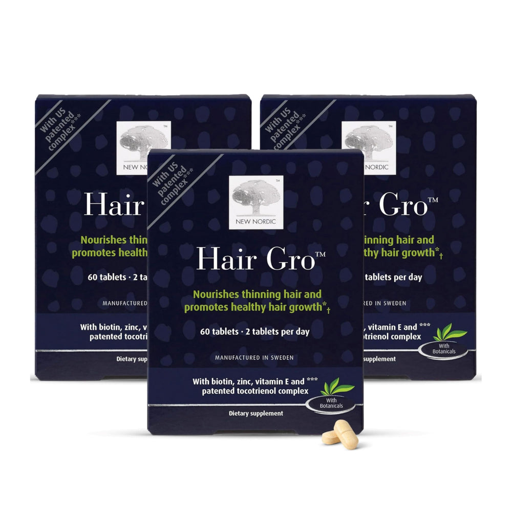 NEW NORDIC Hair GRO bottle closeup showing vegan palm tocotrienol formula for hair support