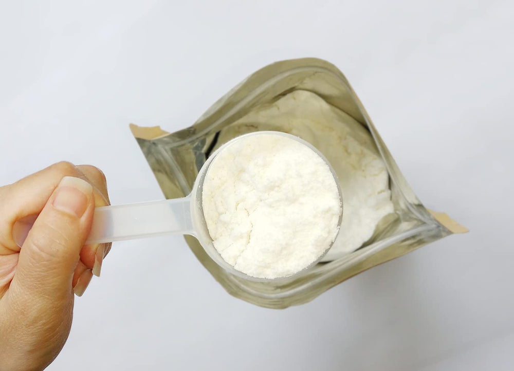 NMNWed whey shake in glass, refreshing protein boost without flavor addition.