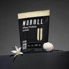 NOBULL vanilla whey protein scoop with powder ideal for workouts.