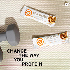 No Cow chunky peanut butter bar on kitchen counter ideal for quick bites.