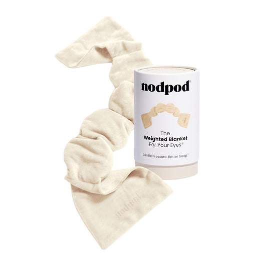 Nodpod gentle pressure sleep mask front view in bone color for light blocking