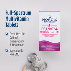 Nordic Naturals Prenatal Multivitamin bottle resting on a clean shelf