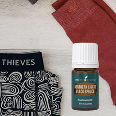 Young Living Northern Black Spruce for hair care and shine.