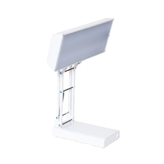 Northern Lights NLT lamp front view with 10,000 lux illumination at desk.