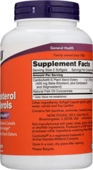 NOW Foods SPO beta-sitosterol softgels with fish oil bottle beside a glass of water.
