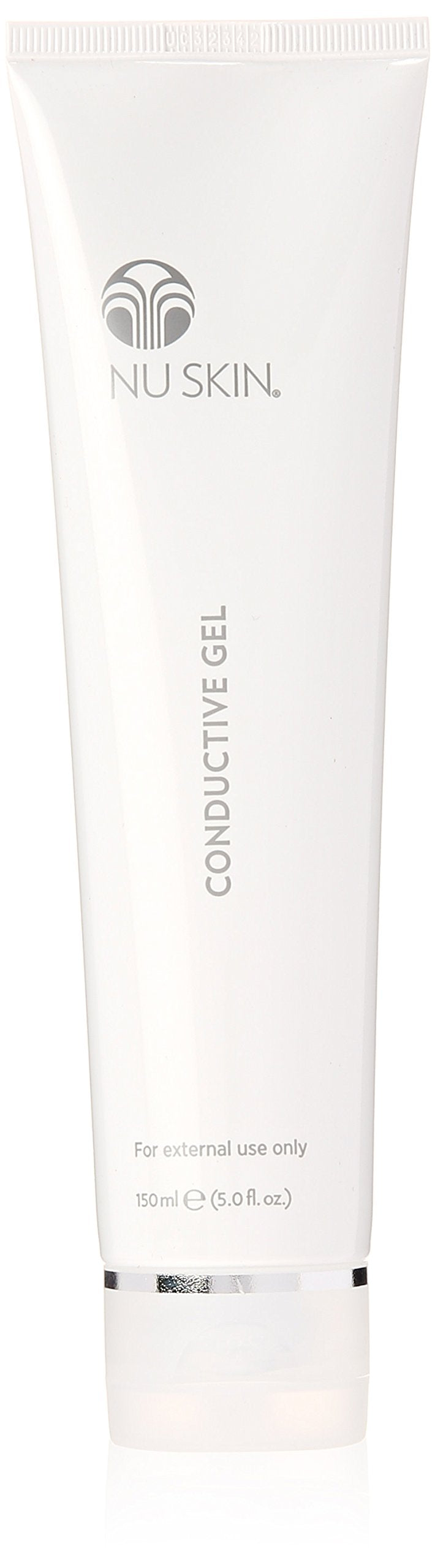 Nu Skin Conductive Gel bottle pour enhances glide during facial spa.