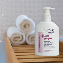 Numis Med packaging emphasizes no dyes for sensitive skin.
