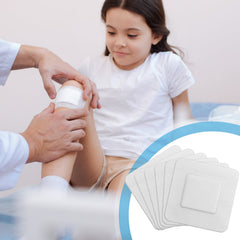 Nuogo adhesive border helps keep dressing in place during activities.