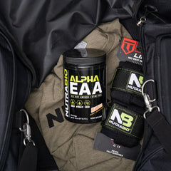 NutraBio Alpha EAA glass of mixed Peach Tea ready, suggesting hydration and endurance potential