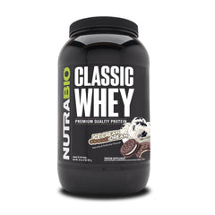 NutraBio Classic Whey scoop in glass for a high-protein post-workout drink
